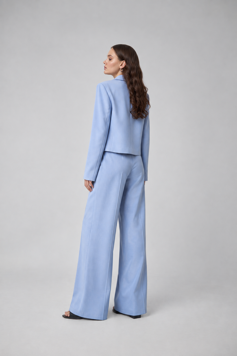 Rear three-quarter view of the blue blazer co-ord set