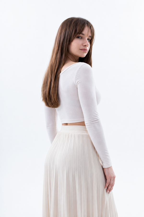 Rear three-quarter view of the ivory cropped top